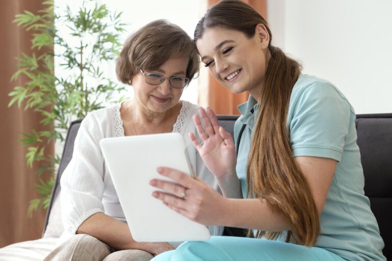 medium-shot-women-looking-tablet